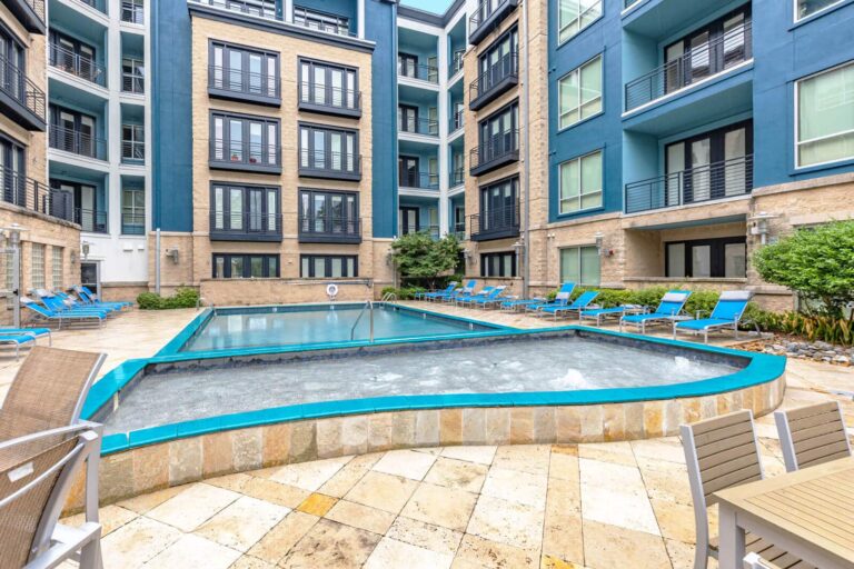Relax under the sun at our resort-style pool at our apartments near Duke University.