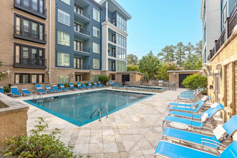 Sit poolside at our resort-style pool at our Duke University apartments.